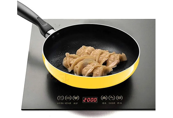 yellow cooking wok